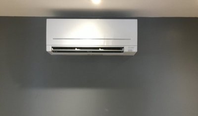 Installation d'une climatisation réversible Mitsubishi dans une maison individuelle à Lons-le-Saunier