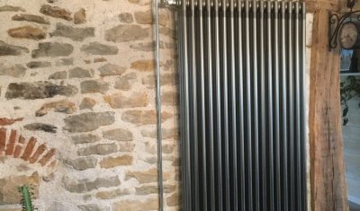 Installation d'un radiateur Design imitation fonte à Lons-le-Saunier